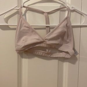 light pink ivivva sports bra